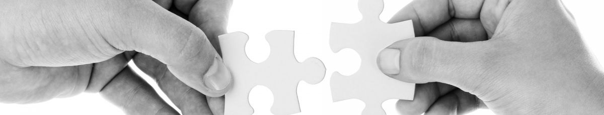 two jigsaw parts nearly connected