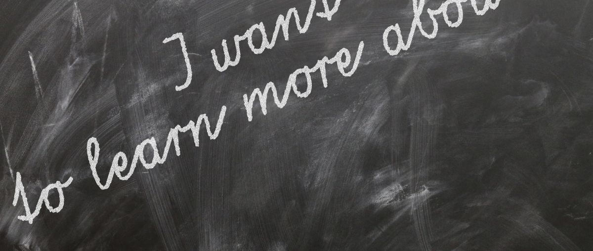 blackboard text that reads I want to learn more about...