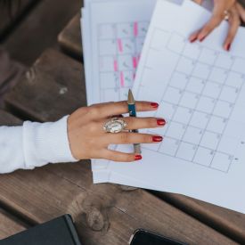 A person planning her course calendar