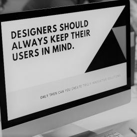 A gray image of a computer screen that says 'Designers Should Always Keep Their Users in Mind.'