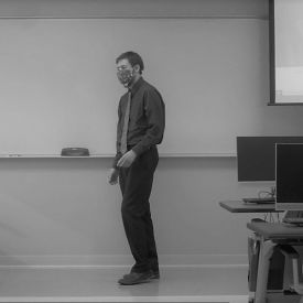 A gray image of an instructor teaching in a Flex classroom